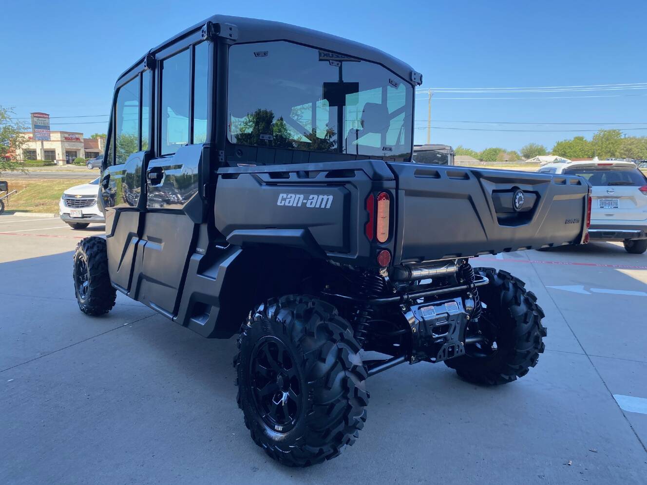 A photo of this 2027 Can-Am Defender MAX DPS CAB HD10 Dolomite Grey