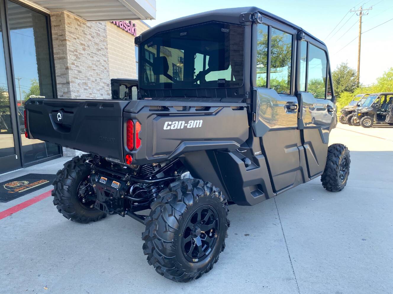 A photo of this 2027 Can-Am Defender MAX DPS CAB HD10 Dolomite Grey
