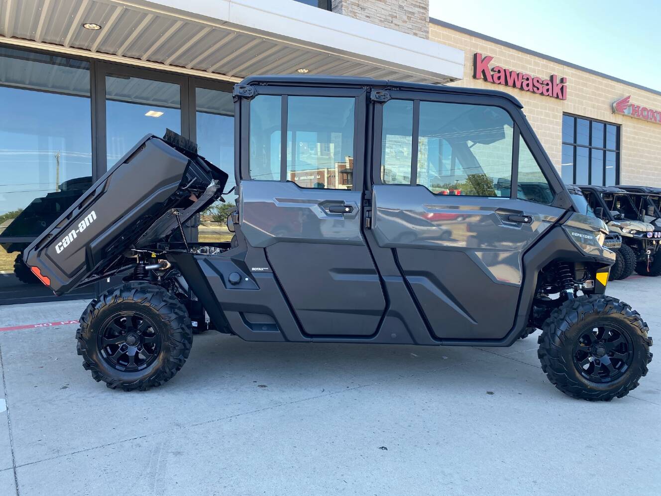 A photo of this 2027 Can-Am Defender MAX DPS CAB HD10 Dolomite Grey