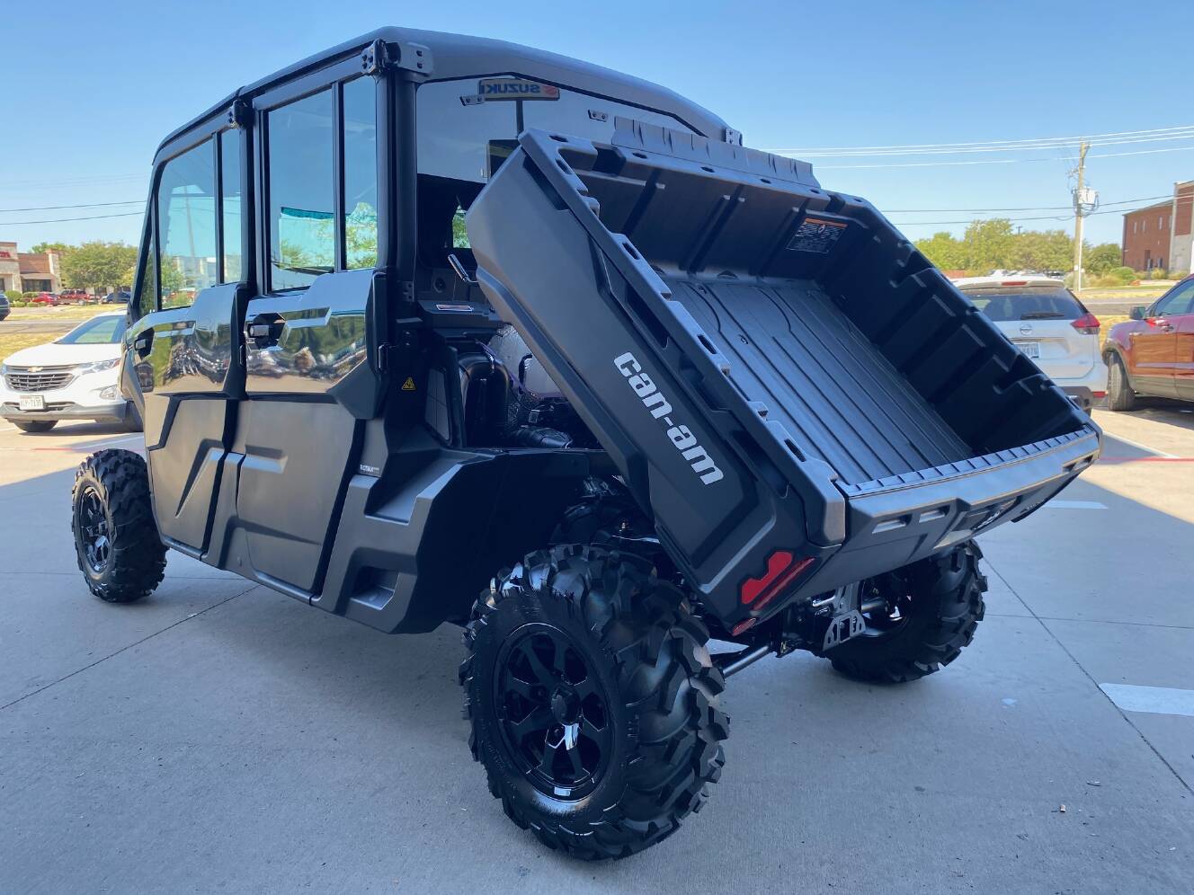 A photo of this 2027 Can-Am Defender MAX DPS CAB HD10 Dolomite Grey