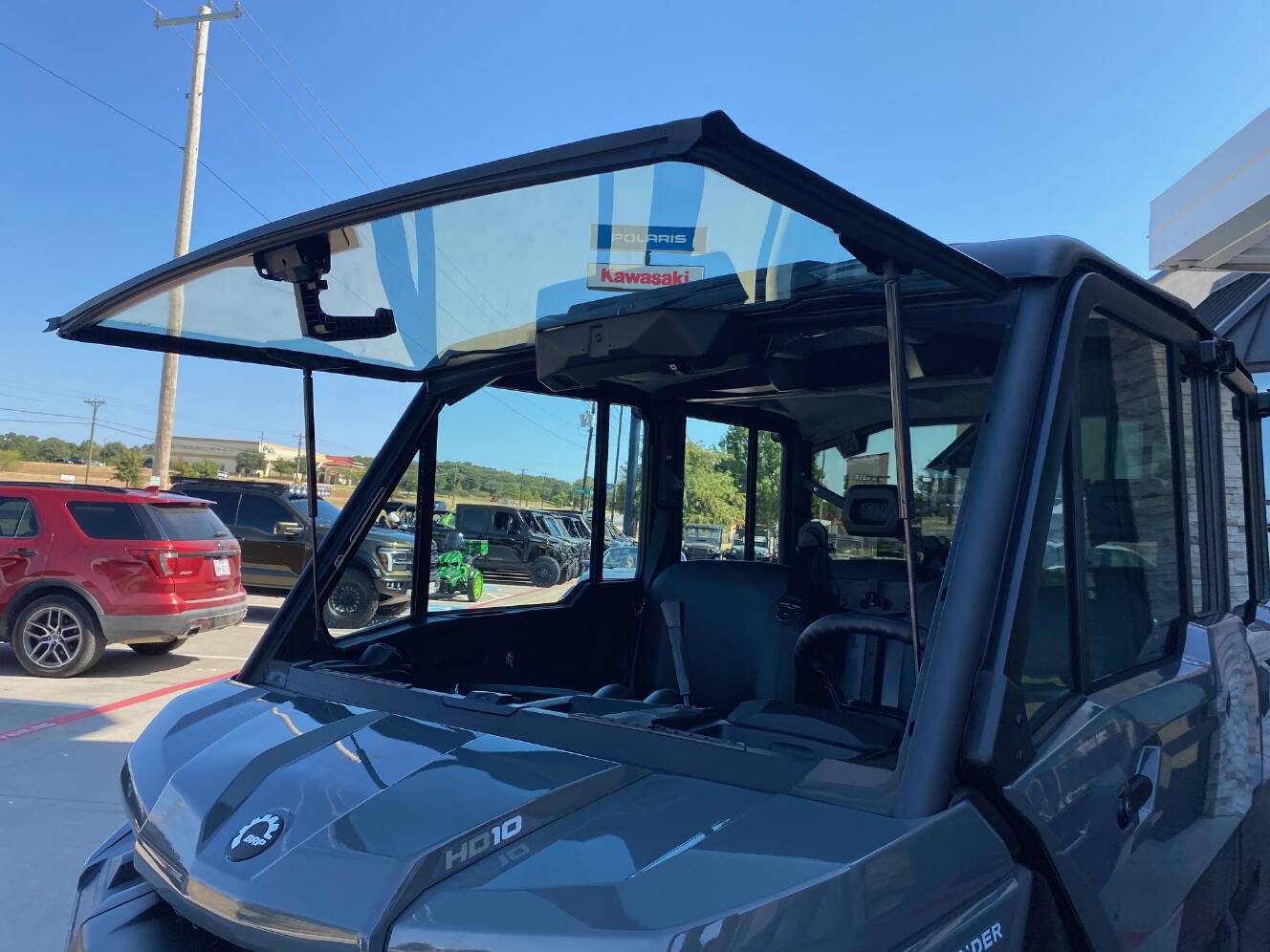A photo of this 2027 Can-Am Defender MAX DPS CAB HD10 Dolomite Grey
