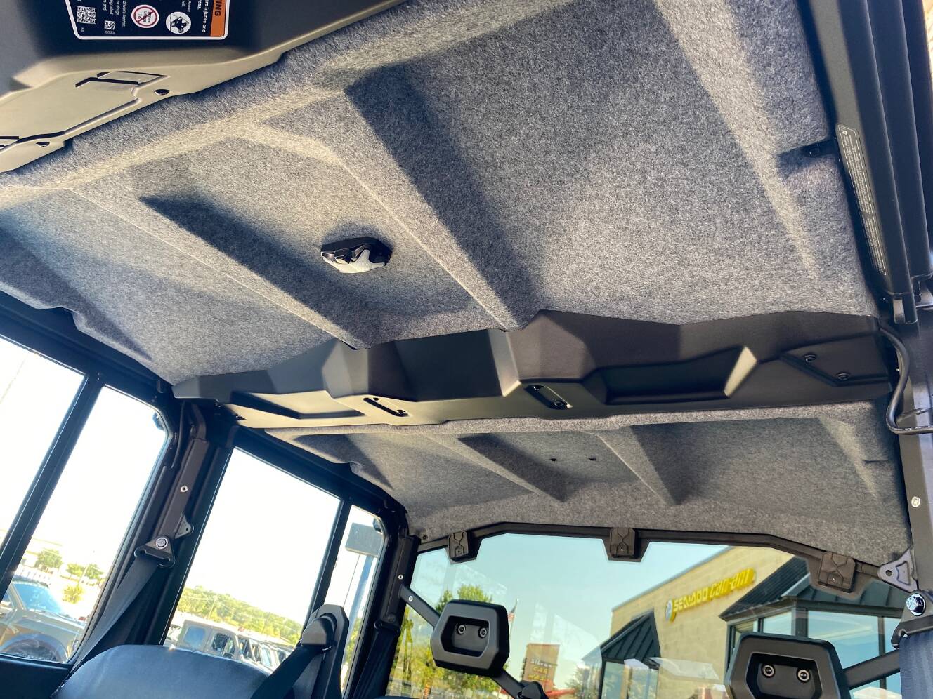 A photo of this 2027 Can-Am Defender MAX DPS CAB HD10 Dolomite Grey