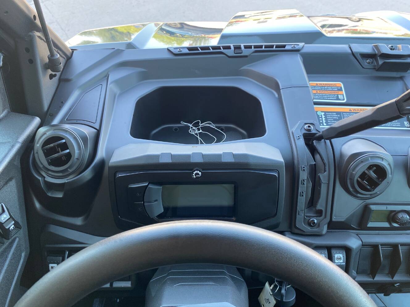 A photo of this 2027 Can-Am Defender MAX DPS CAB HD10 Dolomite Grey