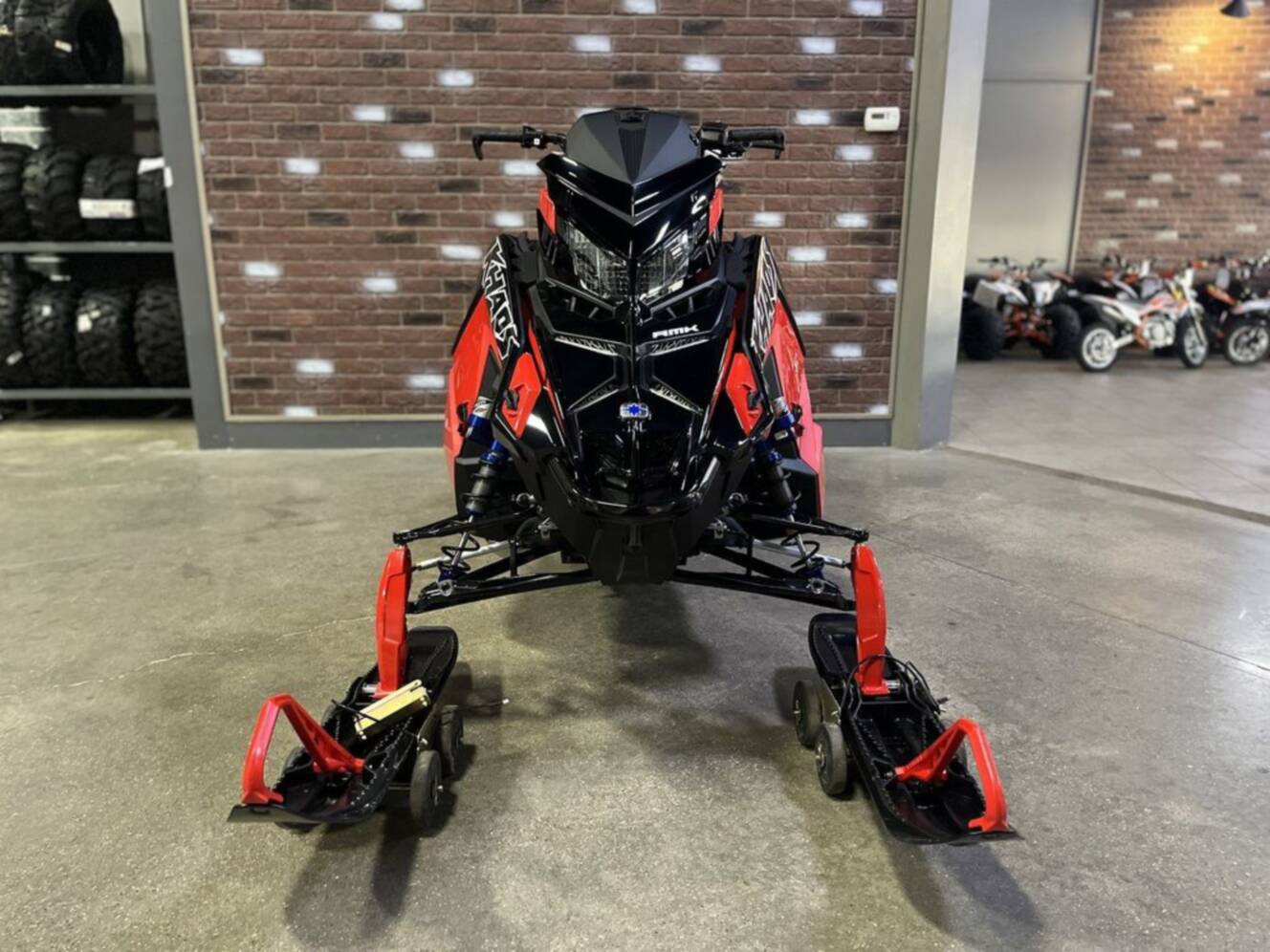 A photo of this 2026 Polaris Patriot 9R RMK Khaos 165 Indy Red / Gloss Black Patriot