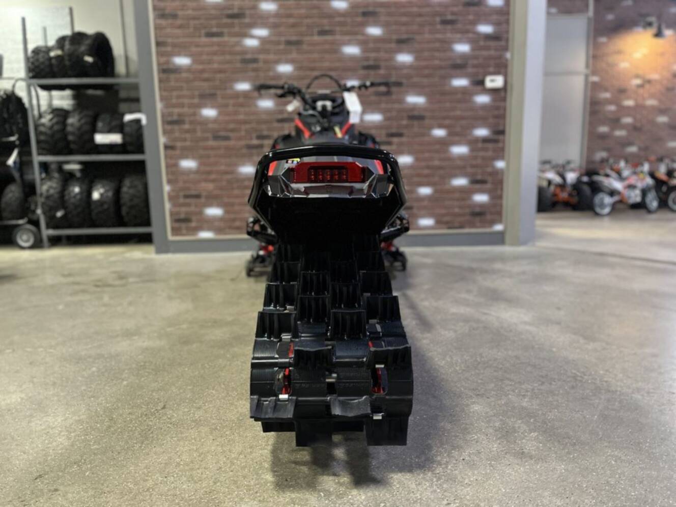 A photo of this 2026 Polaris Patriot 9R RMK Khaos 165 Indy Red / Gloss Black Patriot