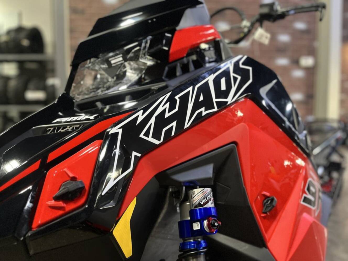 A photo of this 2026 Polaris Patriot 9R RMK Khaos 165 Indy Red / Gloss Black Patriot