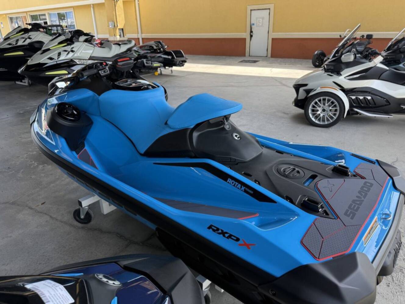 A photo of this 2026 Sea-Doo RXP-X 325 Tech, BRP Premium A, iBR Gulfstream Blue P