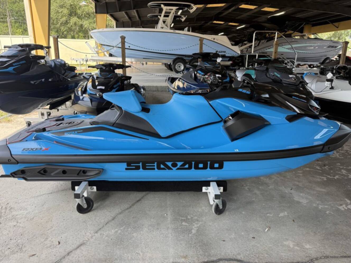 A photo of this 2026 Sea-Doo RXP-X 325 Tech, BRP Premium A, iBR Gulfstream Blue P