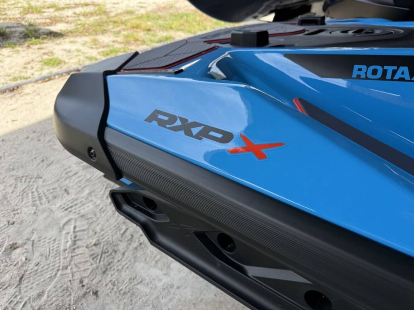 A photo of this 2026 Sea-Doo RXP-X 325 Tech, BRP Premium A, iBR Gulfstream Blue P