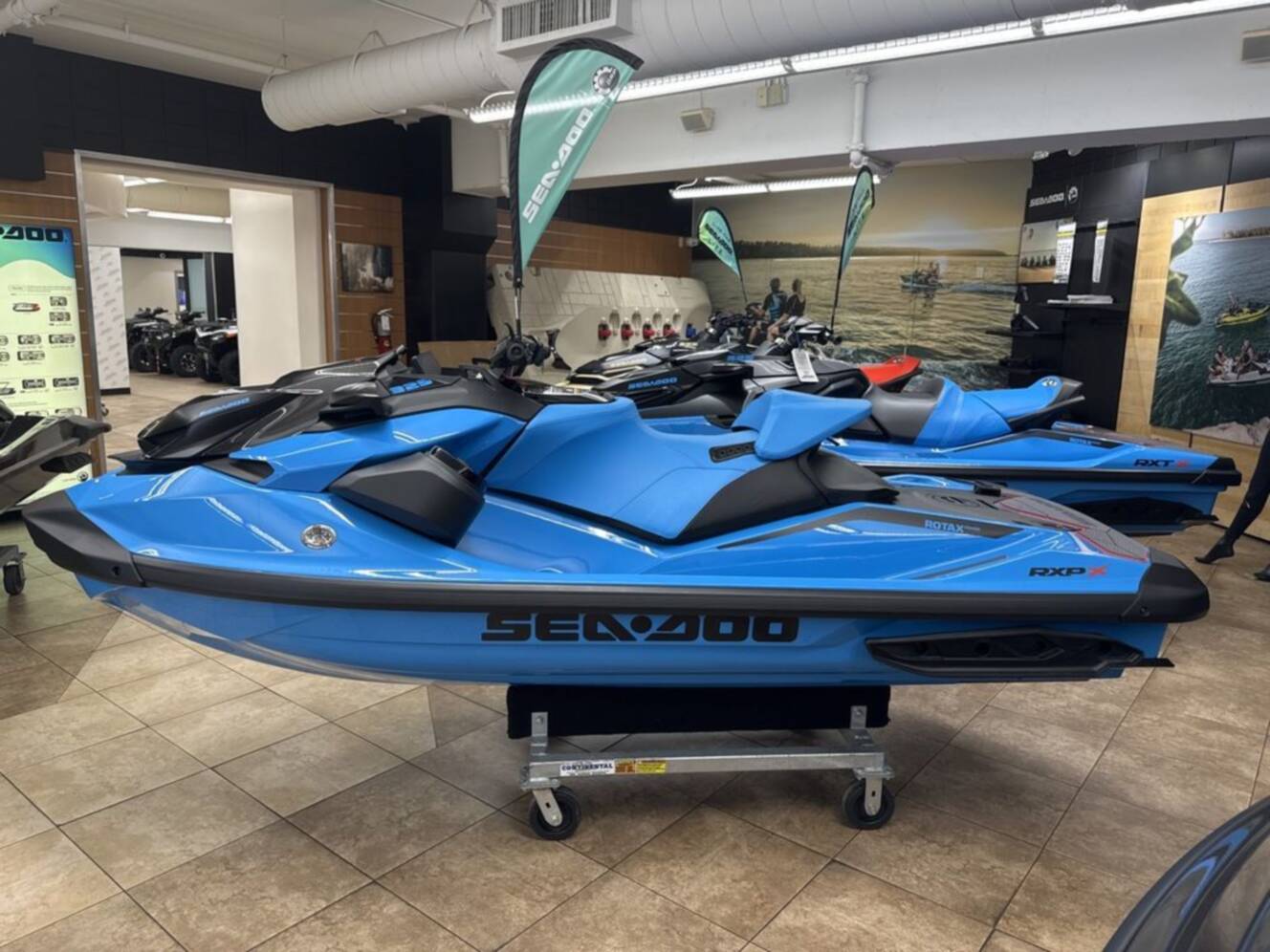 A photo of this 2026 Sea-Doo RXP-X 325 Tech, BRP Premium A, iBR Gulfstream Blue P
