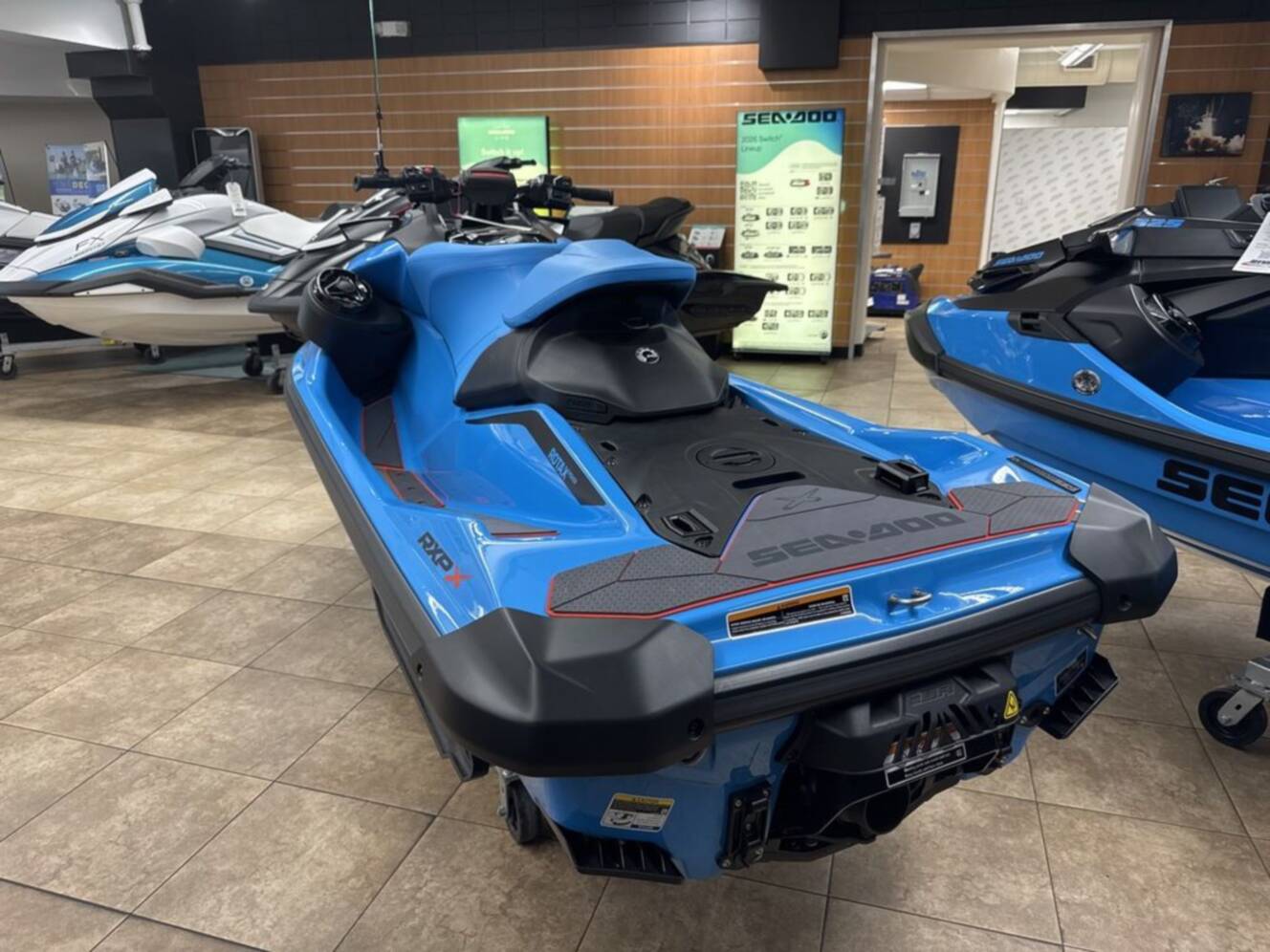 A photo of this 2026 Sea-Doo RXP-X 325 Tech, BRP Premium A, iBR Gulfstream Blue P