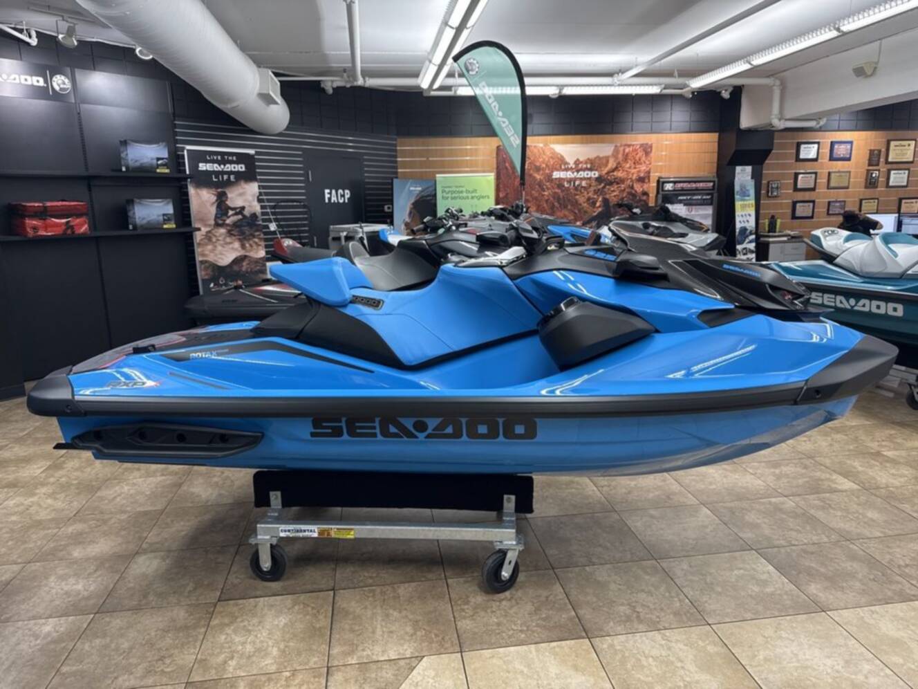 A photo of this 2026 Sea-Doo RXP-X 325 Tech, BRP Premium A, iBR Gulfstream Blue P