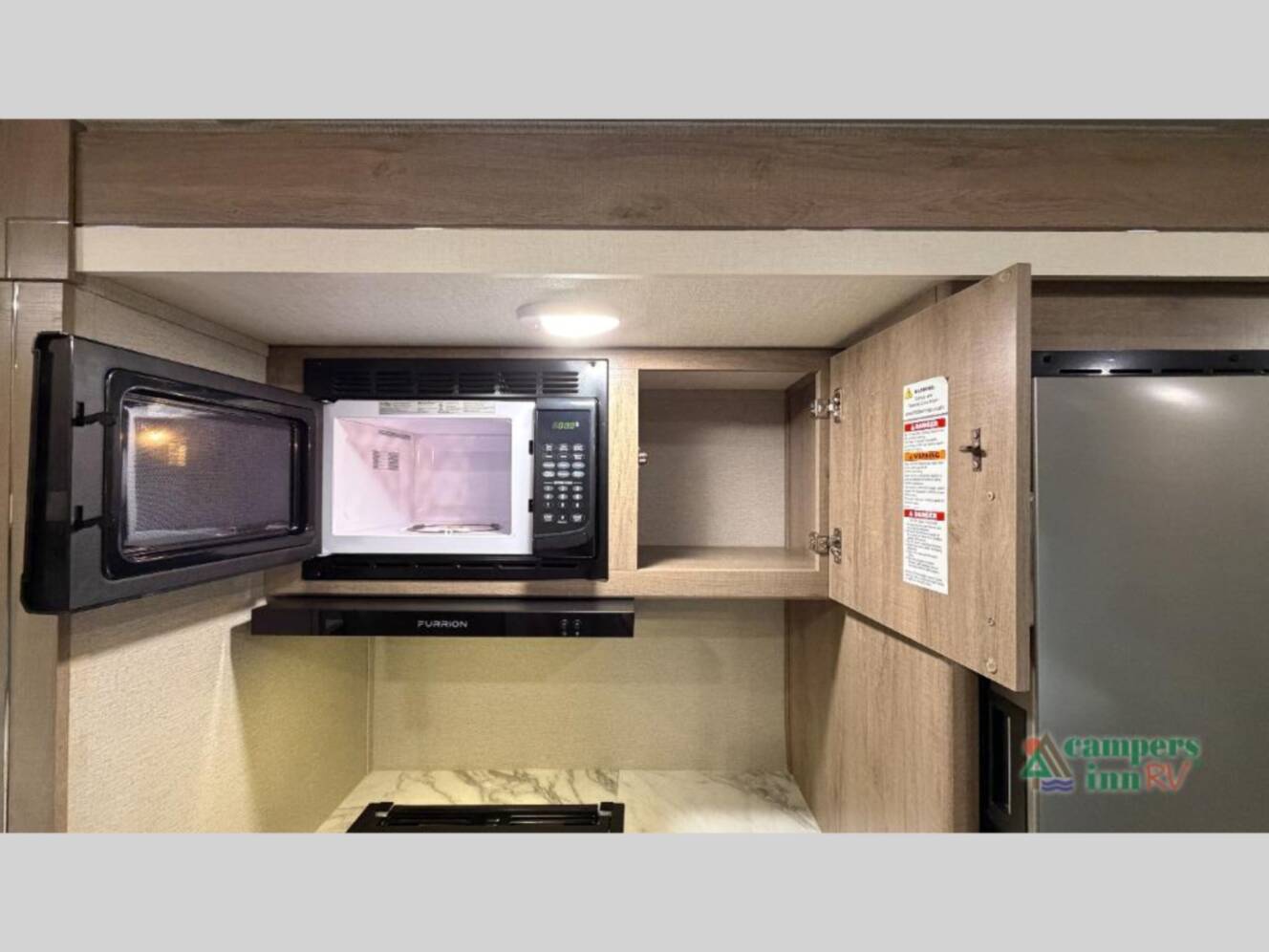 A photo of this 2022 Grand Design Imagine 22mle