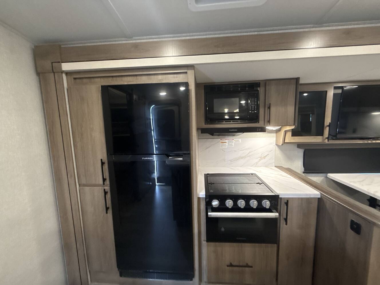 A photo of this 2023 Grand Design IMAGINE 3210BH