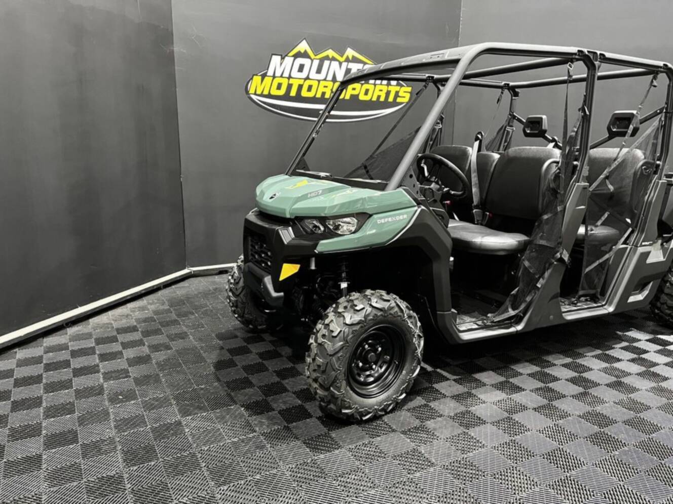 A photo of this 2026 Can-Am Defender MAX DPS HD7 Compass Green