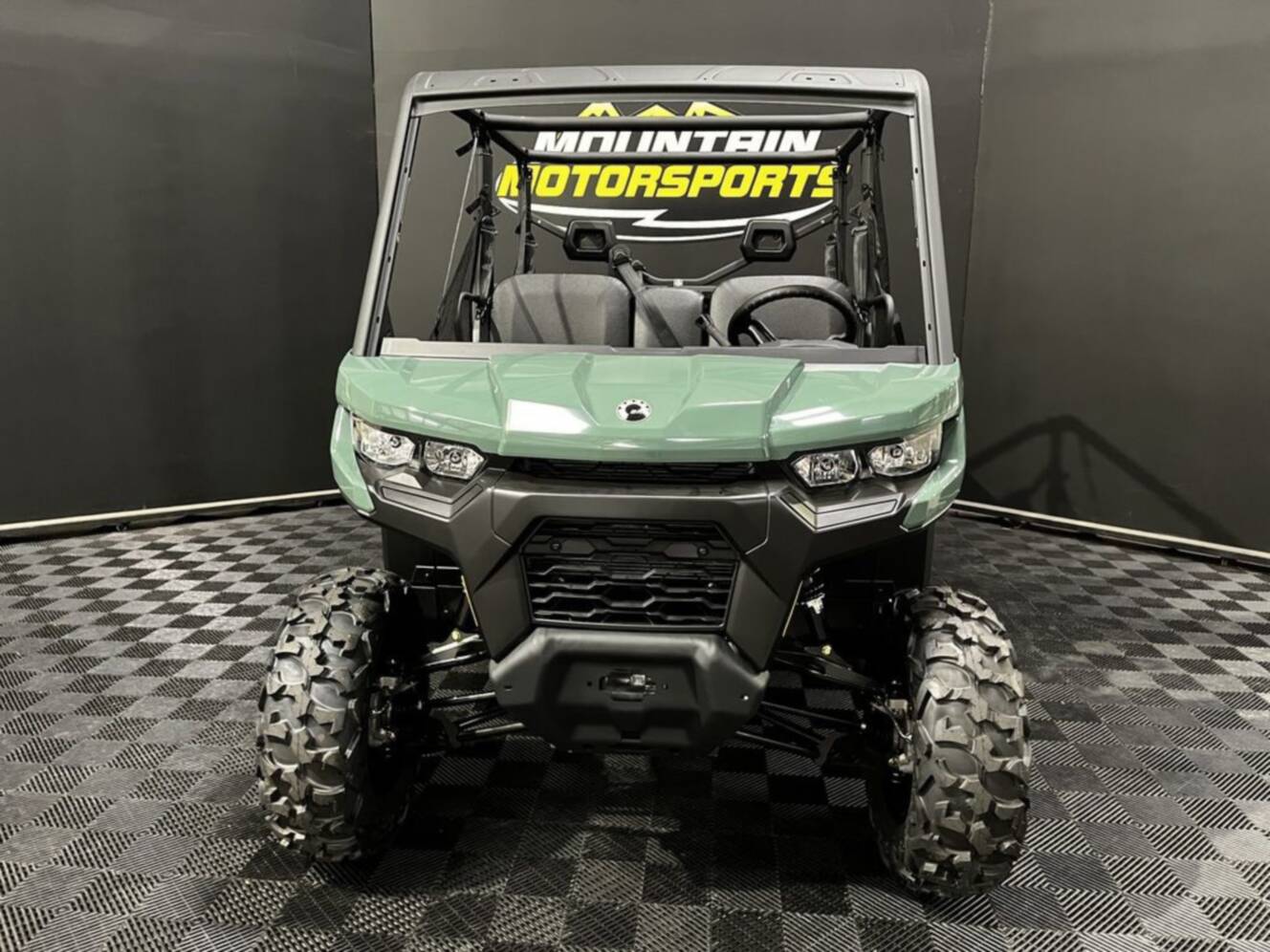 A photo of this 2026 Can-Am Defender MAX DPS HD7 Compass Green