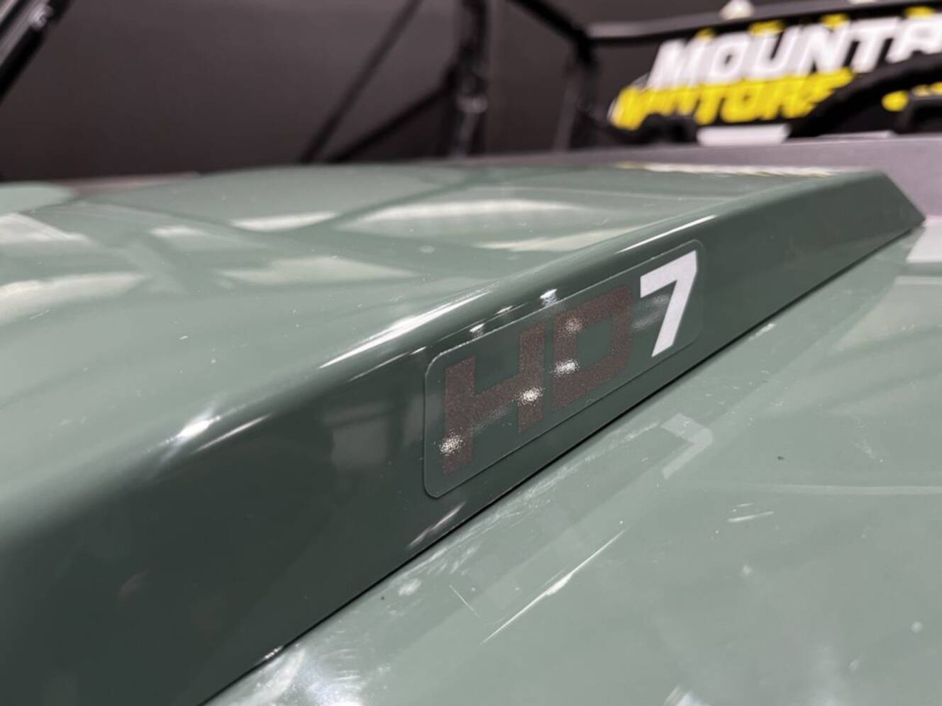 A photo of this 2026 Can-Am Defender MAX DPS HD7 Compass Green