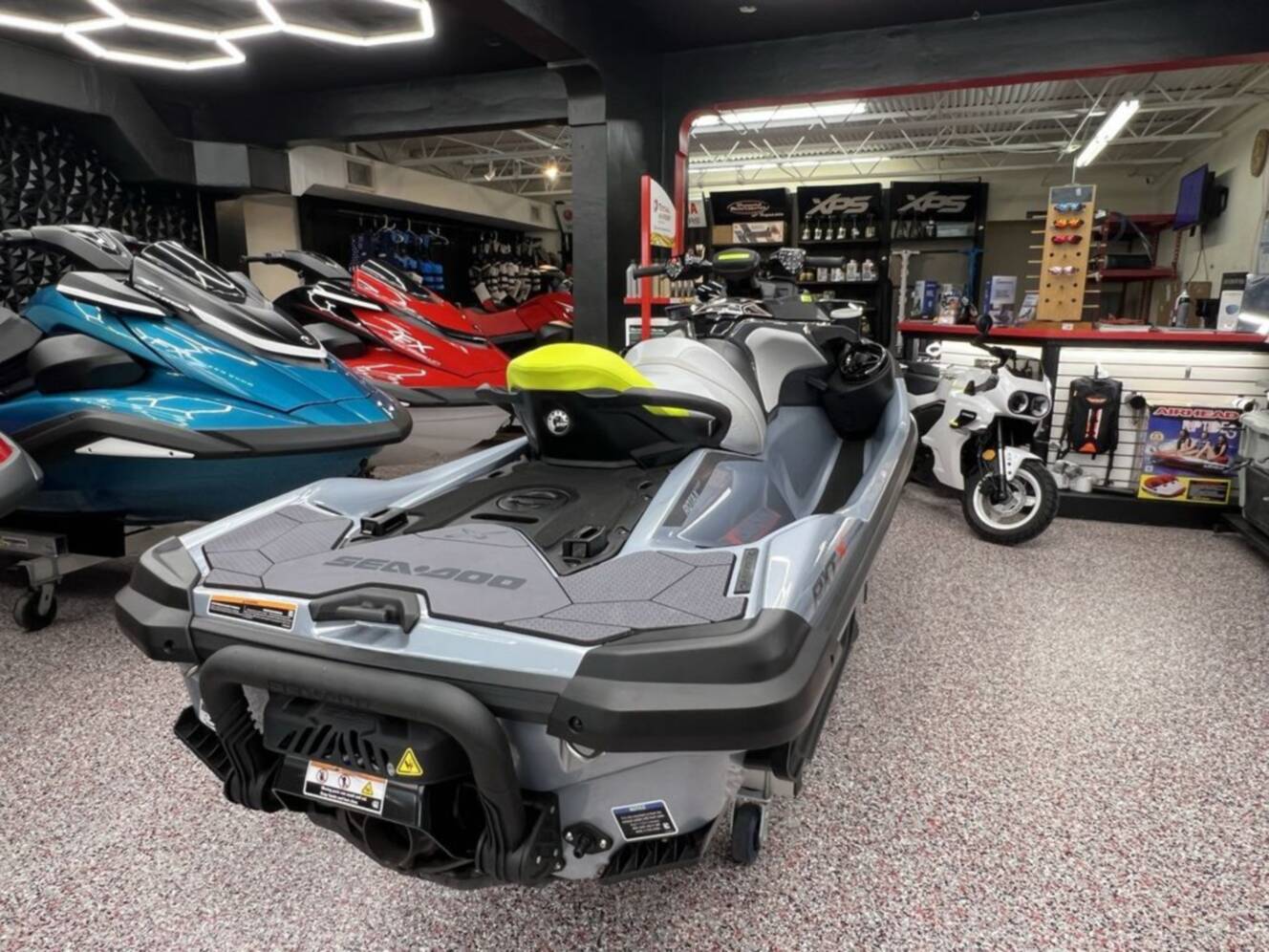 A photo of this 2025 Sea-Doo RXT-X 325 Ice Metal / Manta Green