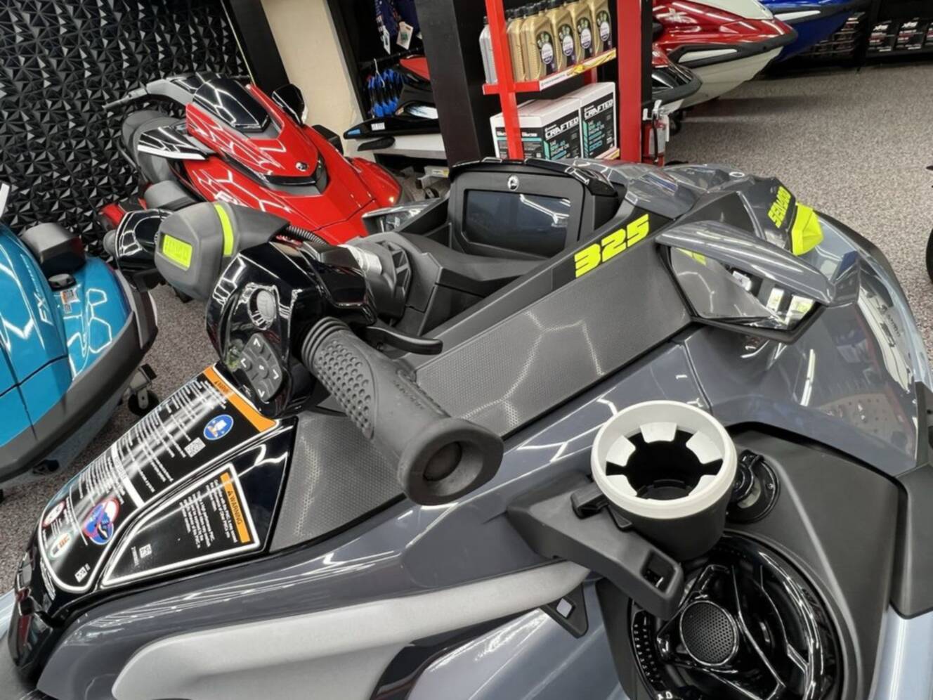 A photo of this 2025 Sea-Doo RXT-X 325 Ice Metal / Manta Green
