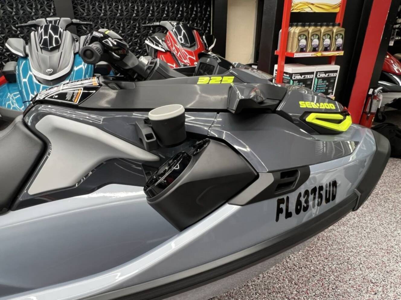 A photo of this 2025 Sea-Doo RXT-X 325 Ice Metal / Manta Green