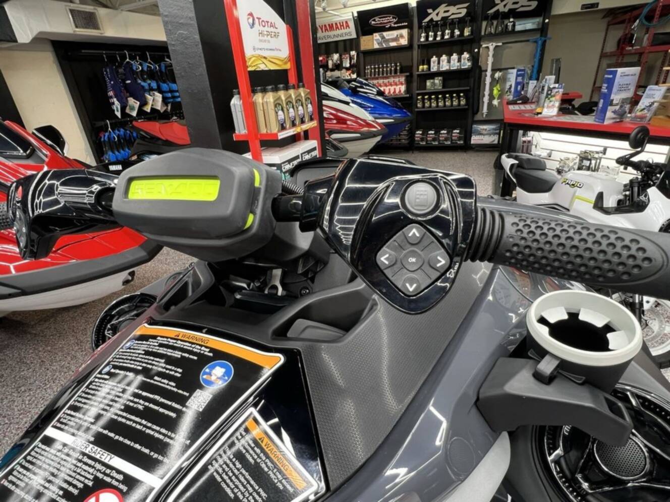 A photo of this 2025 Sea-Doo RXT-X 325 Ice Metal / Manta Green