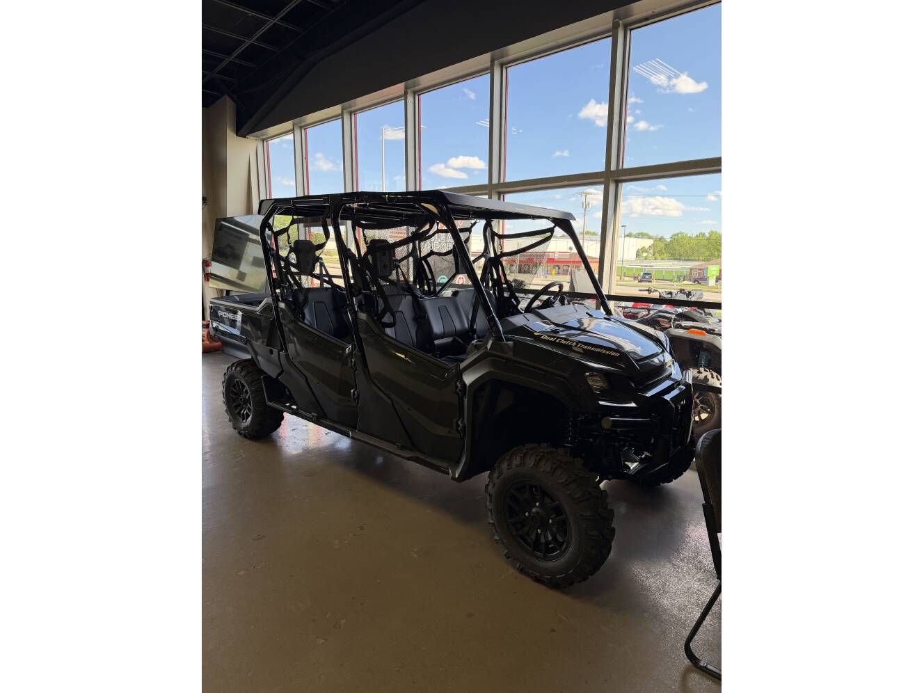A photo of this 2025 Honda PIONEER 1000-6 DELUXE CREW