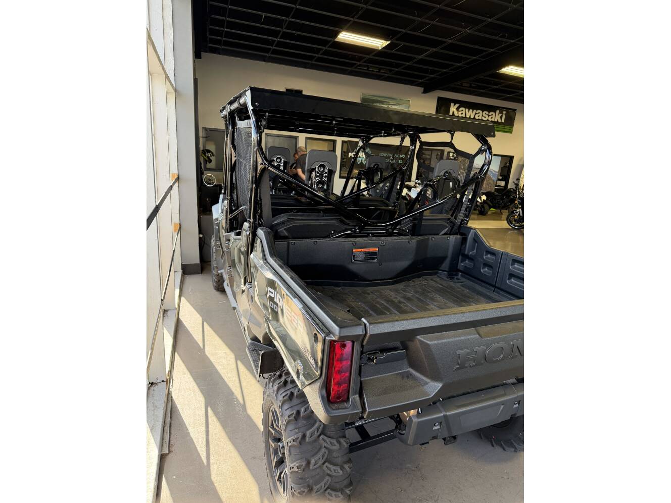 A photo of this 2025 Honda PIONEER 1000-6 DELUXE CREW