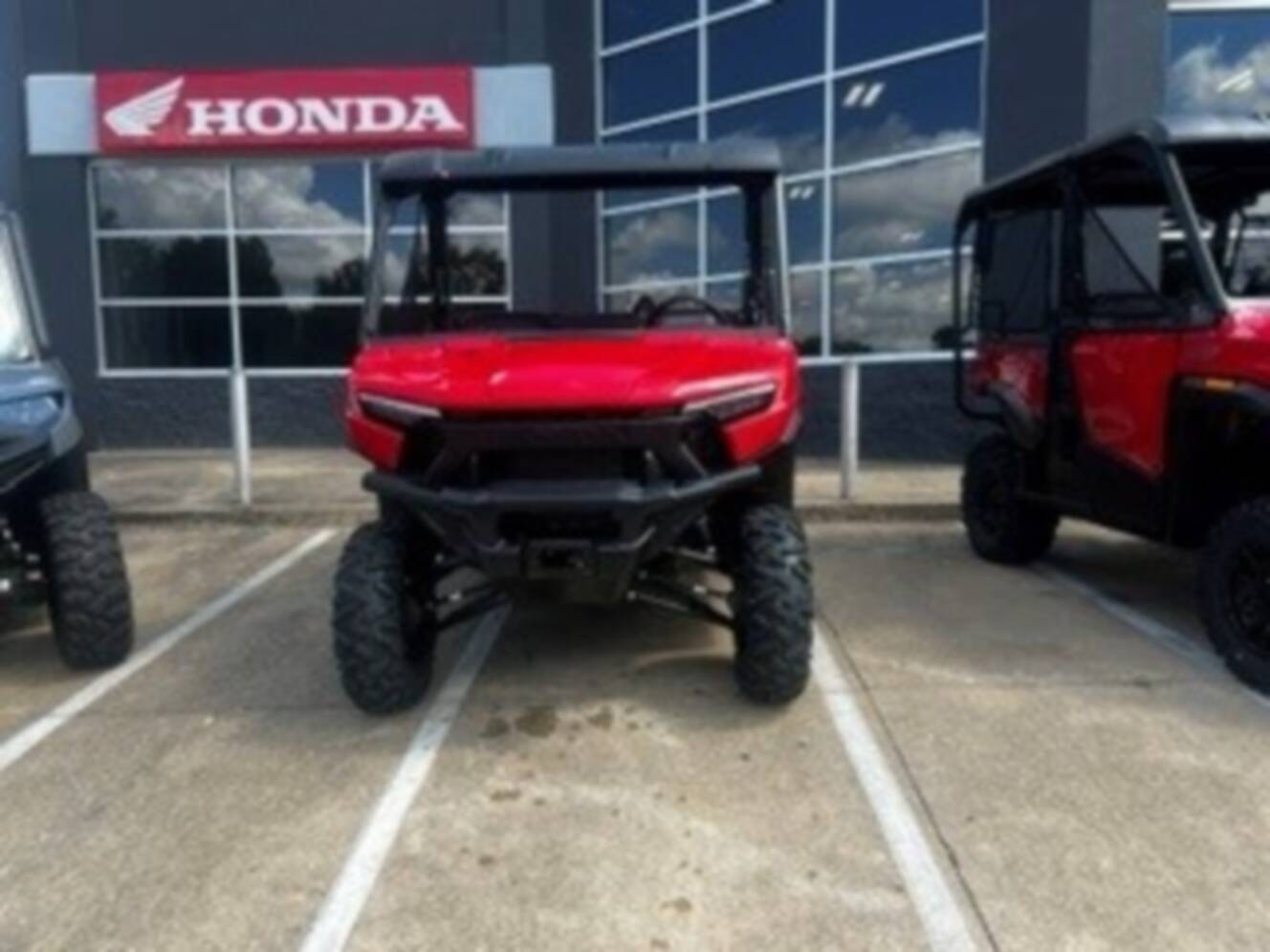 A photo of this 2026 Honda Pioneer 1000 Deluxe