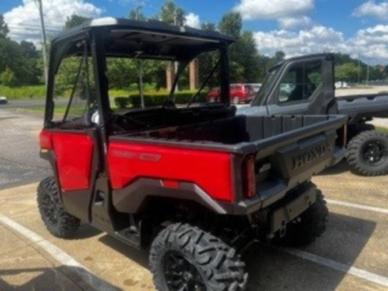 A photo of this 2026 Honda Pioneer 1000 Deluxe