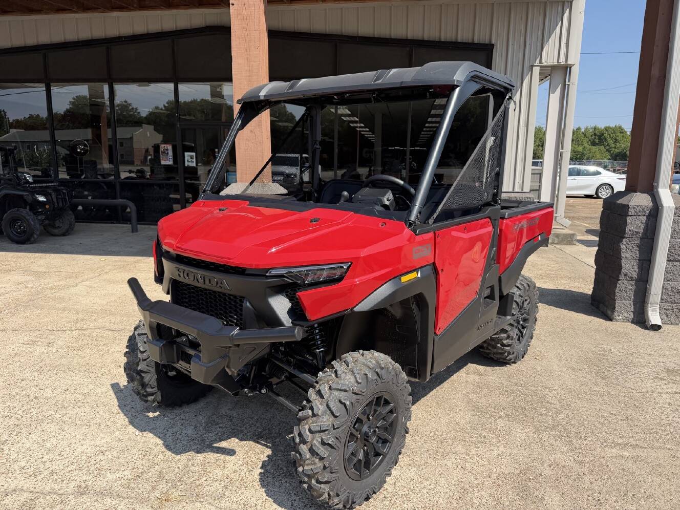 A photo of this 2026 Honda Pioneer 1000 Deluxe