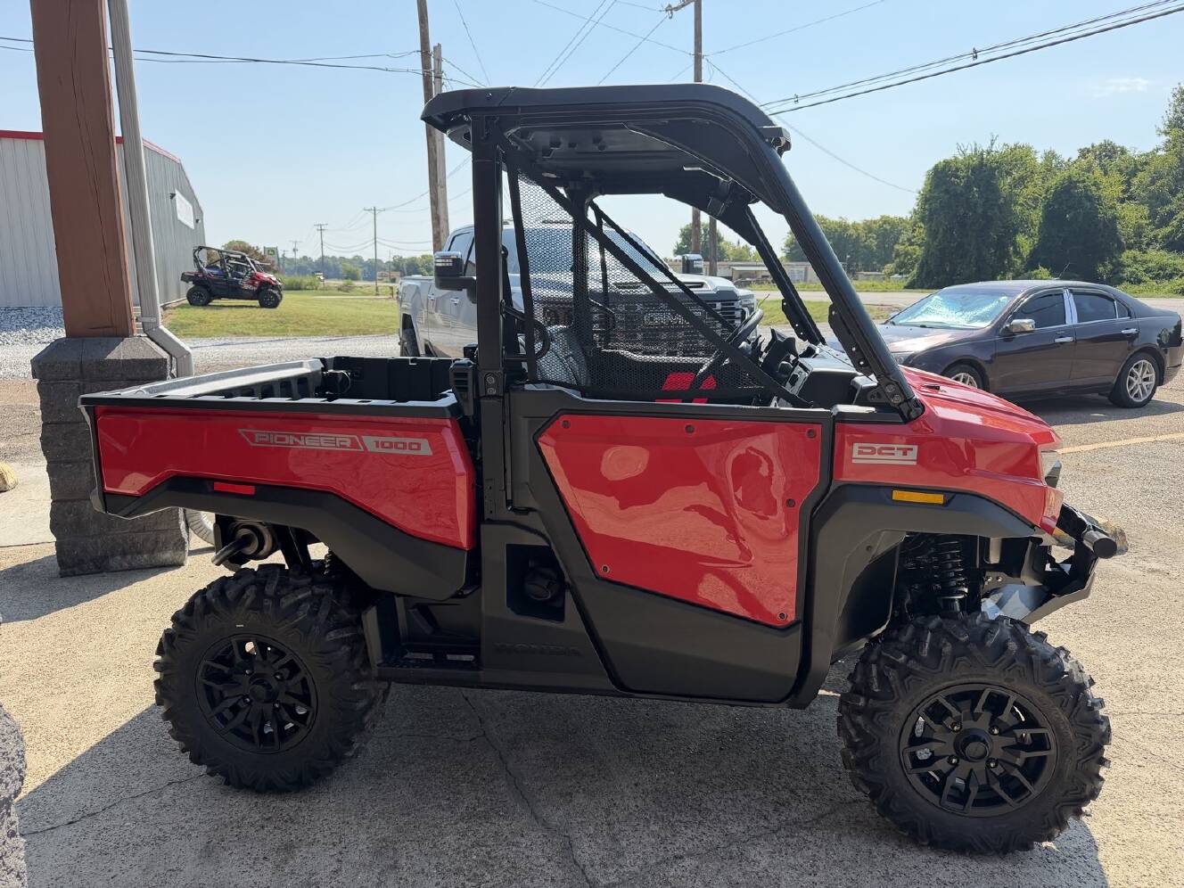A photo of this 2026 Honda Pioneer 1000 Deluxe