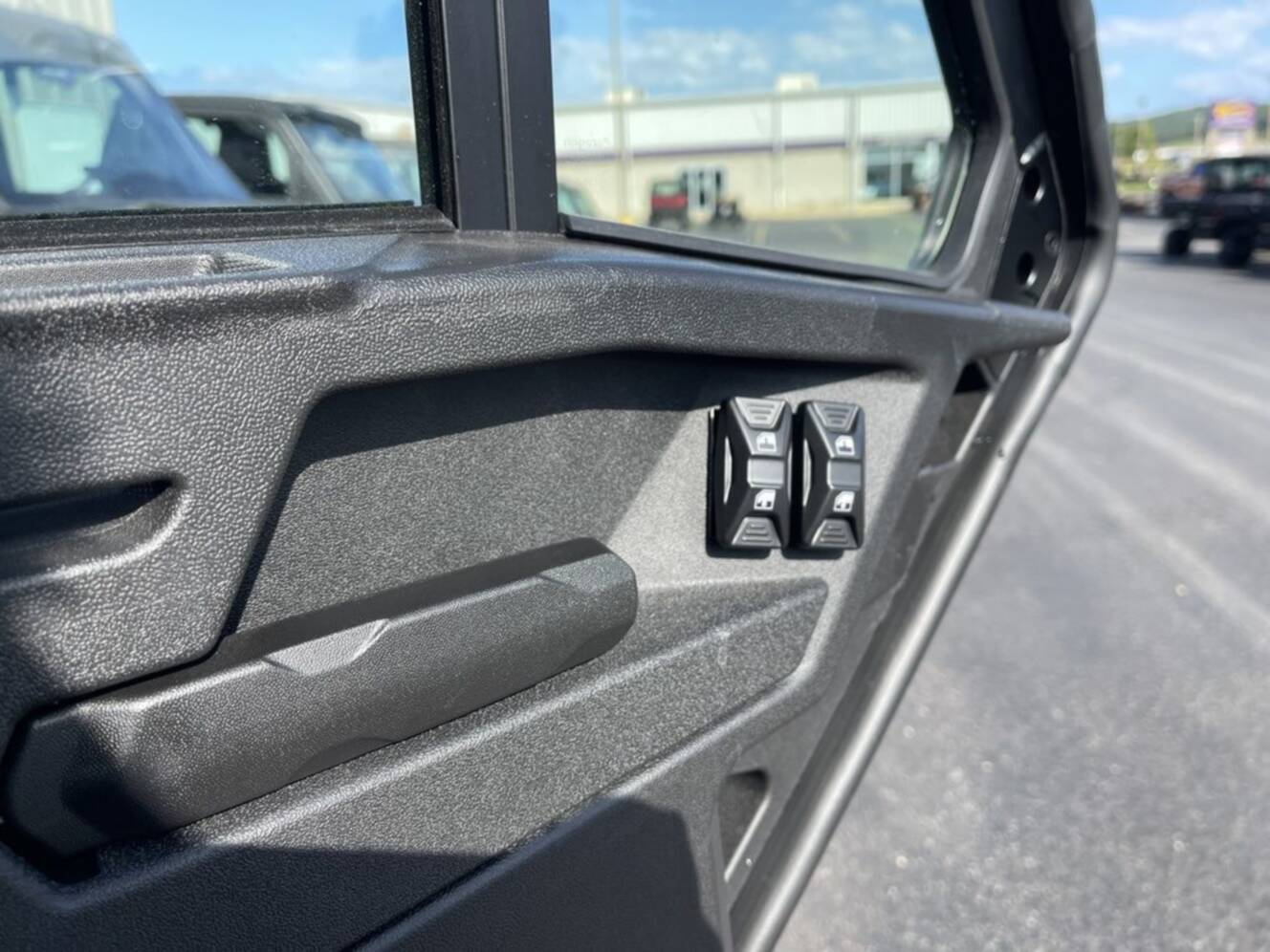 A photo of this 2027 Can-Am Defender MAX DPS CAB HD10 Dolomite Grey