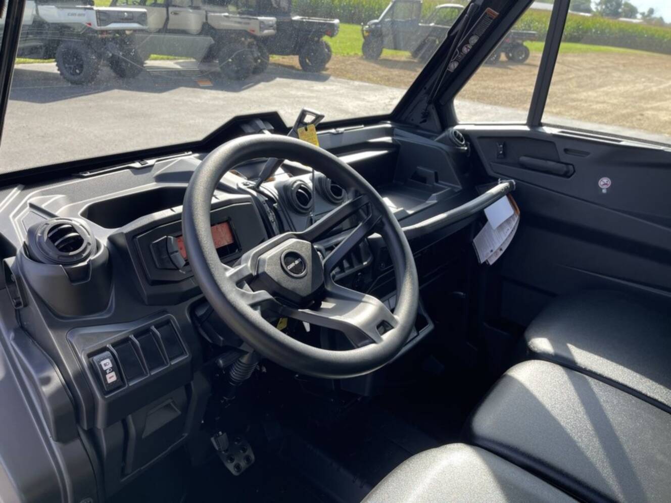 A photo of this 2027 Can-Am Defender MAX DPS CAB HD10 Dolomite Grey