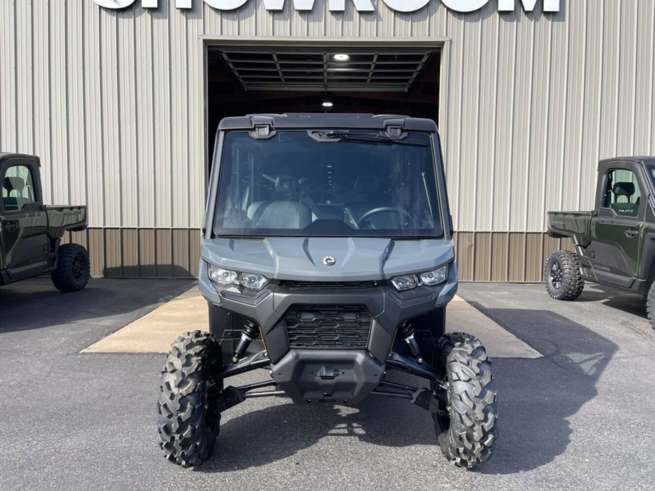 A photo of this 2027 Can-Am Defender MAX DPS CAB HD10 Dolomite Grey