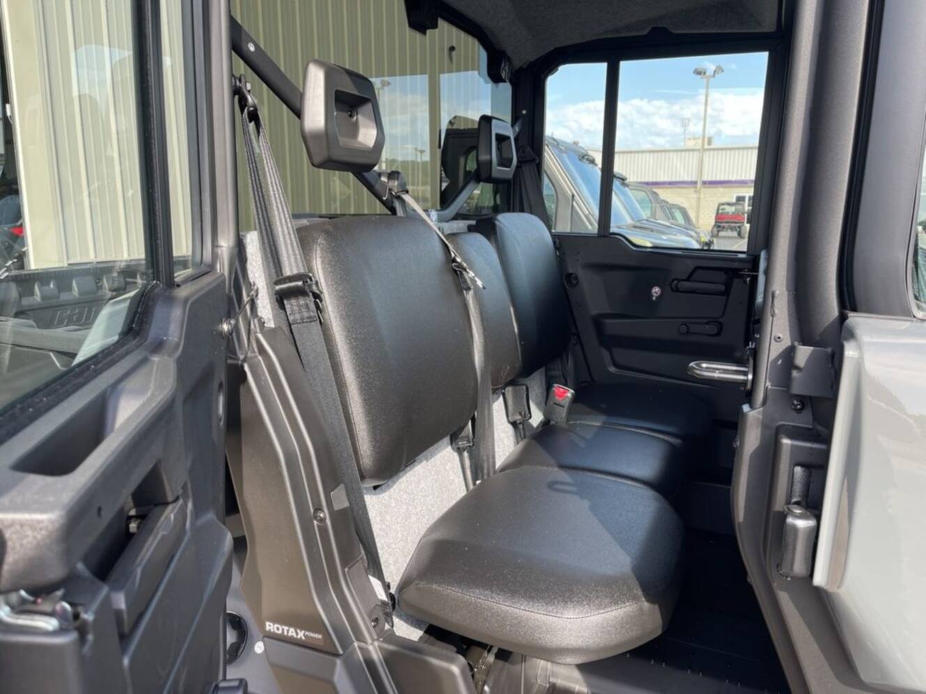 A photo of this 2027 Can-Am Defender MAX DPS CAB HD10 Dolomite Grey