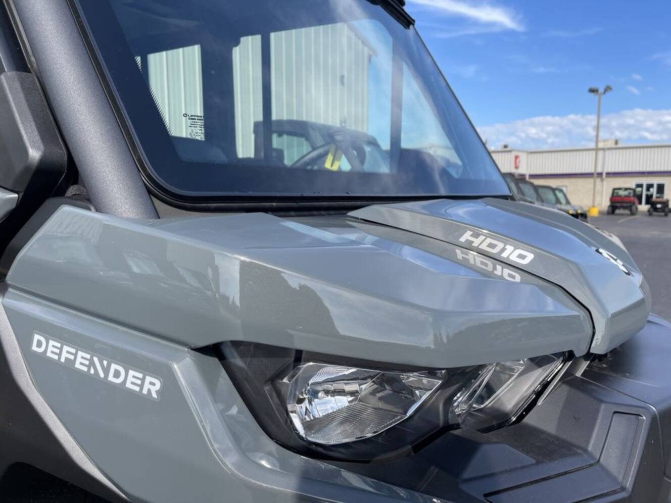 A photo of this 2027 Can-Am Defender MAX DPS CAB HD10 Dolomite Grey