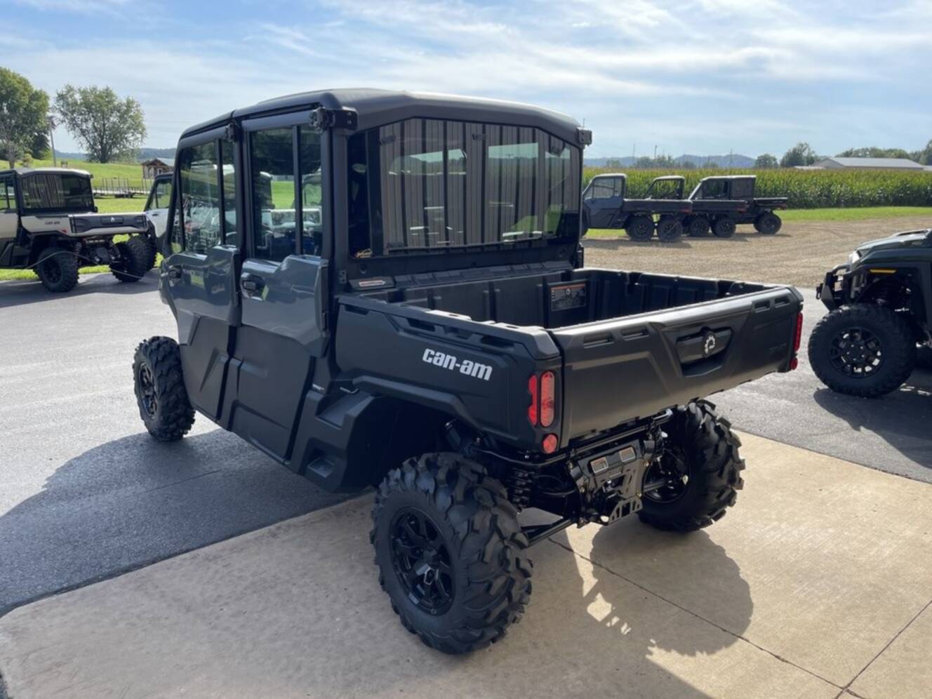 A photo of this 2027 Can-Am Defender MAX DPS CAB HD10 Dolomite Grey