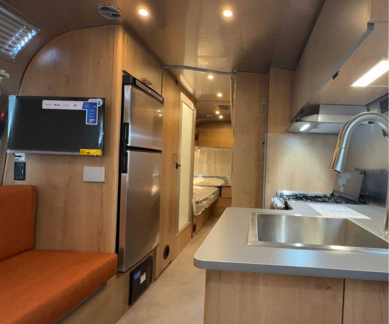 A photo of this 2027 Airstream Trade Wind 25FB Twin
