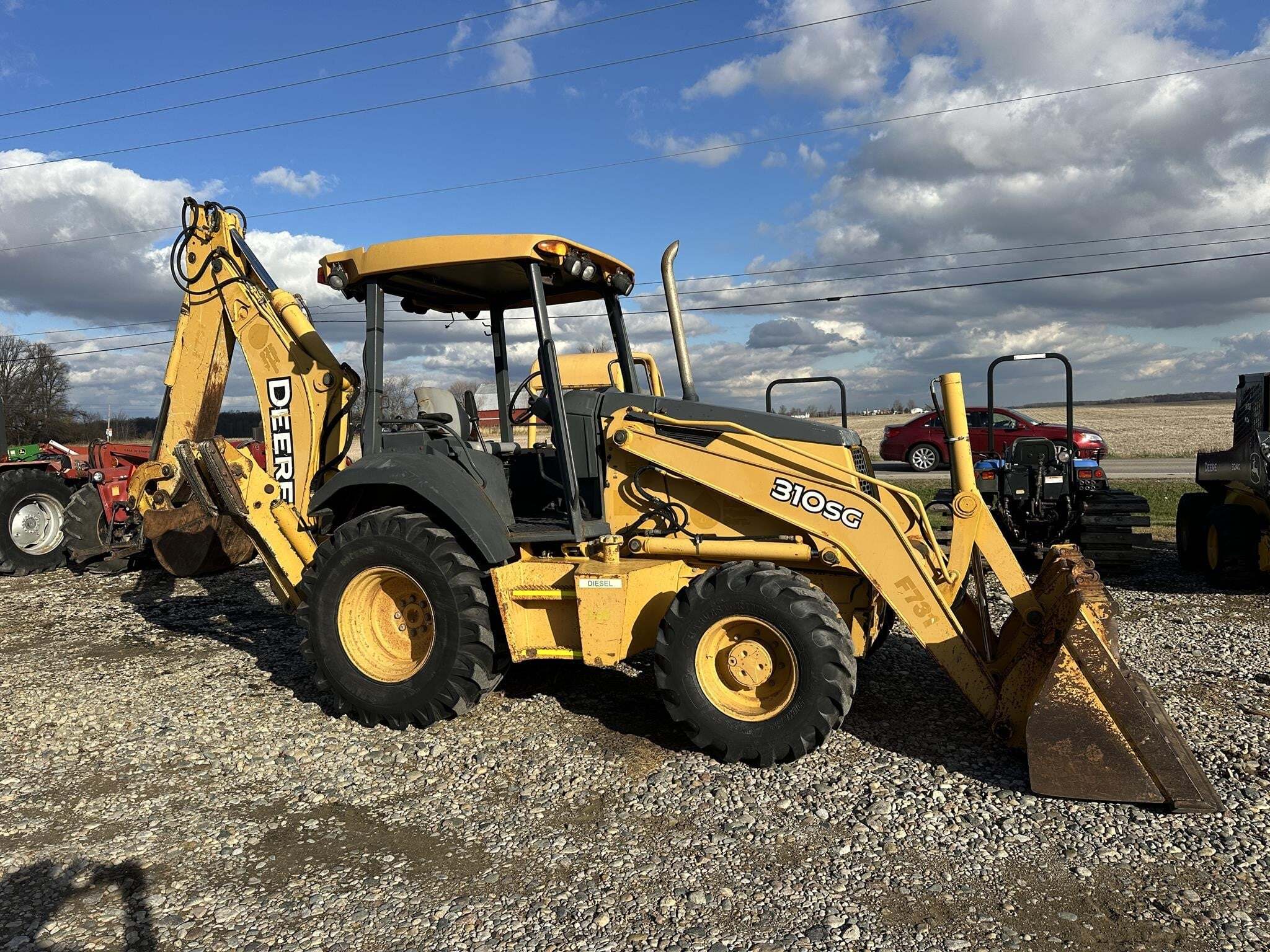 2004 DEERE 310SG in Edon, OH