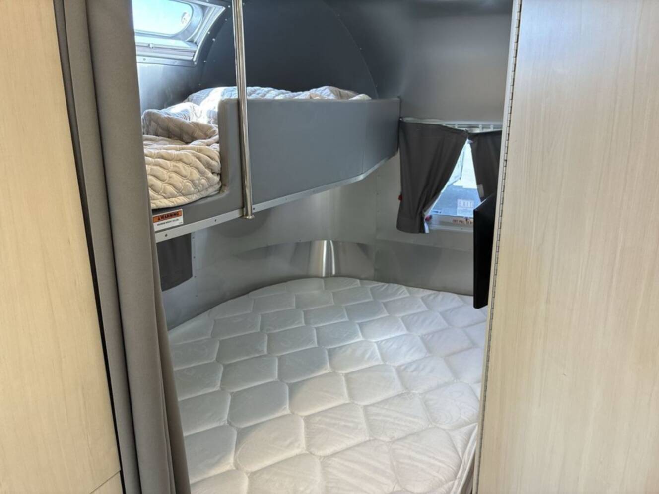 A photo of this 2021 Airstream Flying Cloud 30 Bunk Queen