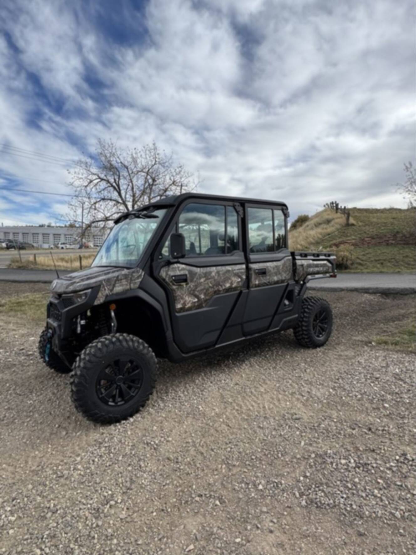A photo of this 2026 CFMOTO UFORCE U10 XL Pro Highland Camo