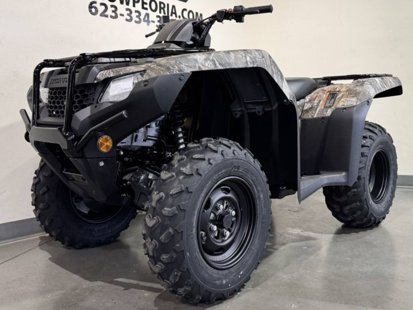 A photo of this 2026 Honda FourTrax Rancher 4X4 Truetimber Atera Camo