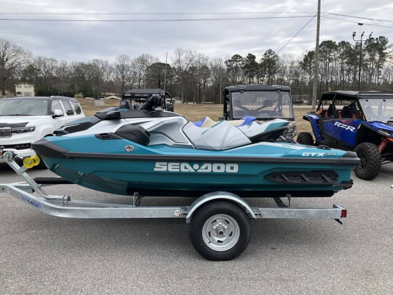 A photo of this 2026 Sea-Doo GTX Limited 325 Teal Metallic