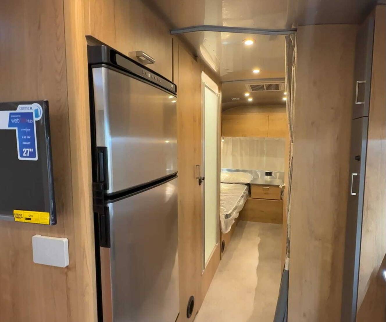 A photo of this 2027 Airstream Trade Wind 25FB Twin