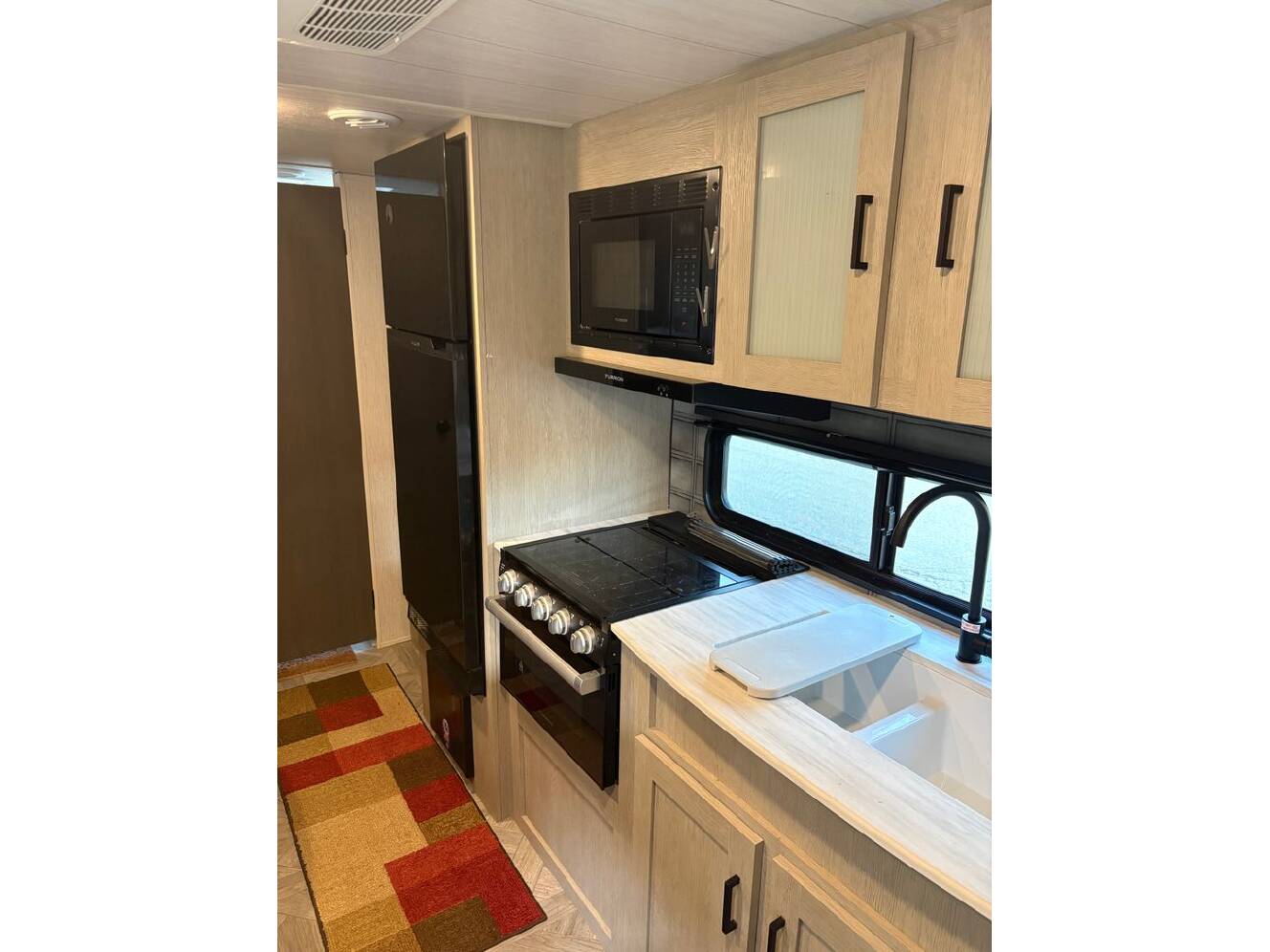 A photo of this 2023 Forest River Wildwood X-Lite 19DBXL