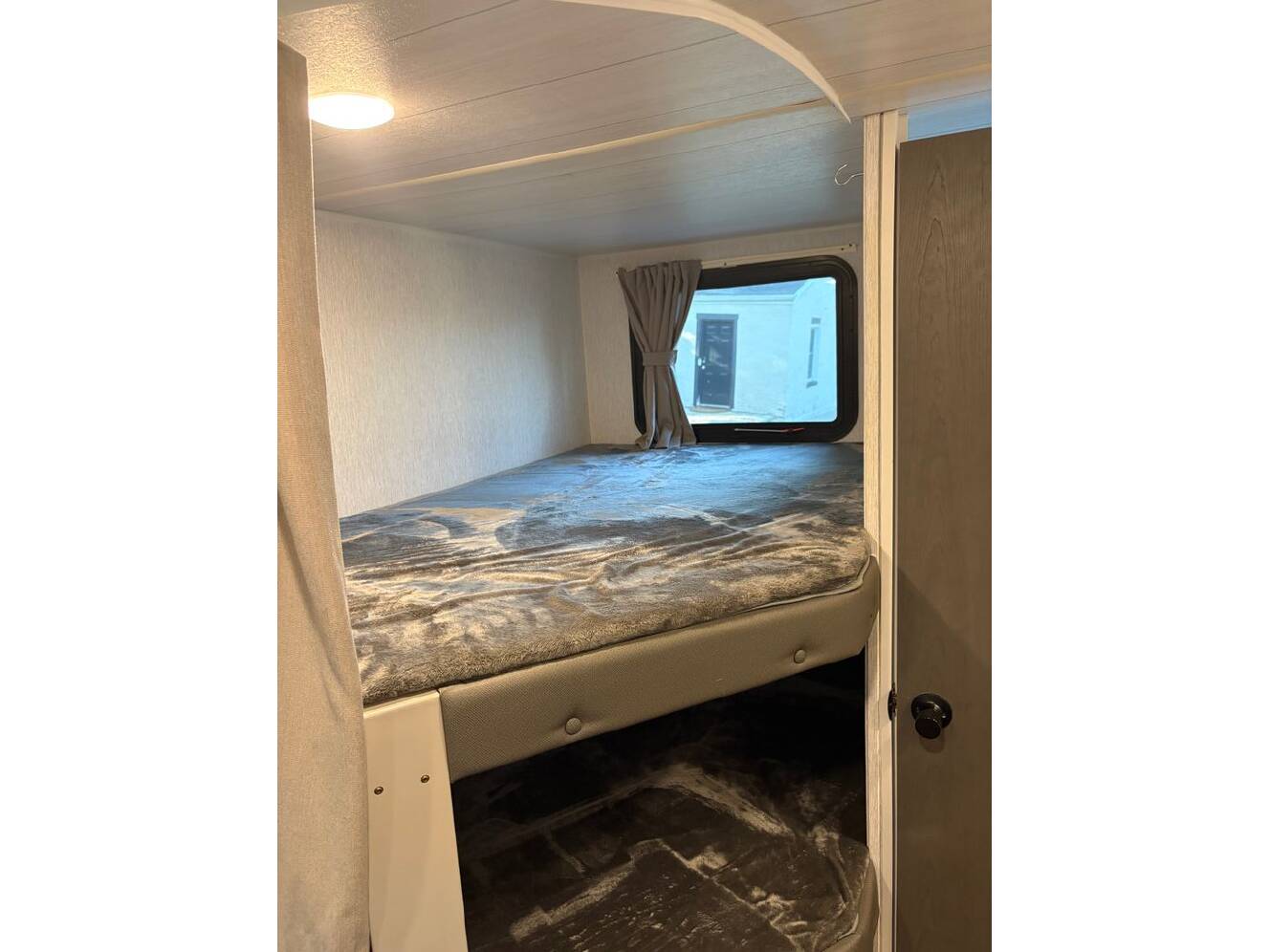 A photo of this 2023 Forest River Wildwood X-Lite 19DBXL
