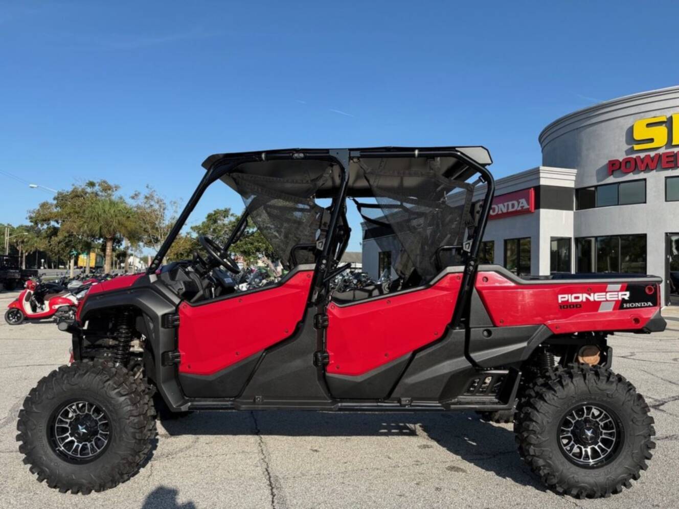 A photo of this 2025 Honda® Pioneer 1000-6 Deluxe Crew