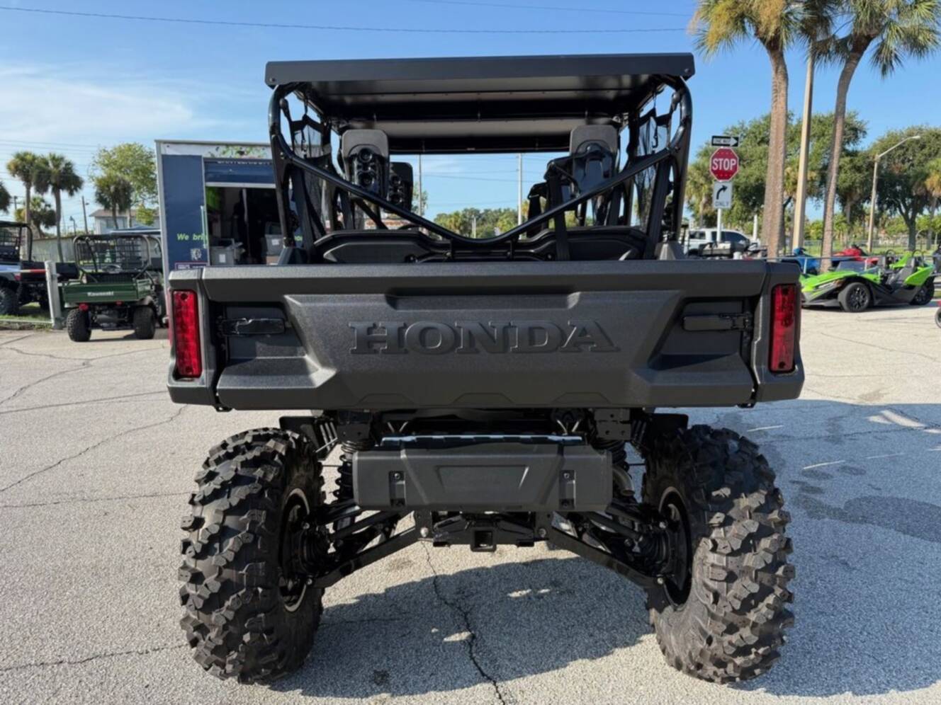 A photo of this 2025 Honda® Pioneer 1000-6 Deluxe Crew