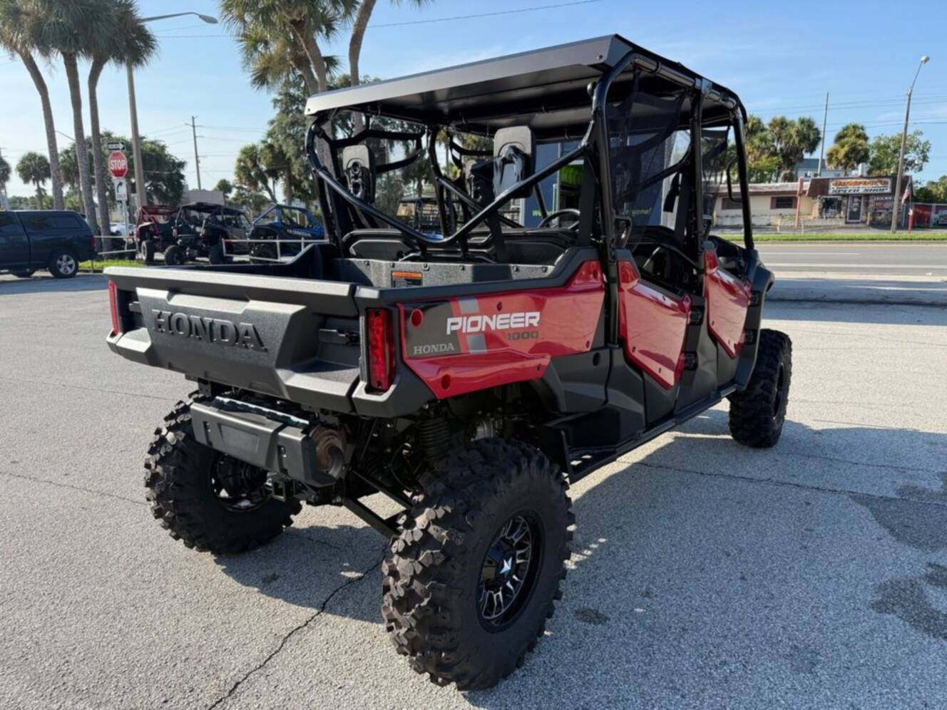 A photo of this 2025 Honda® Pioneer 1000-6 Deluxe Crew