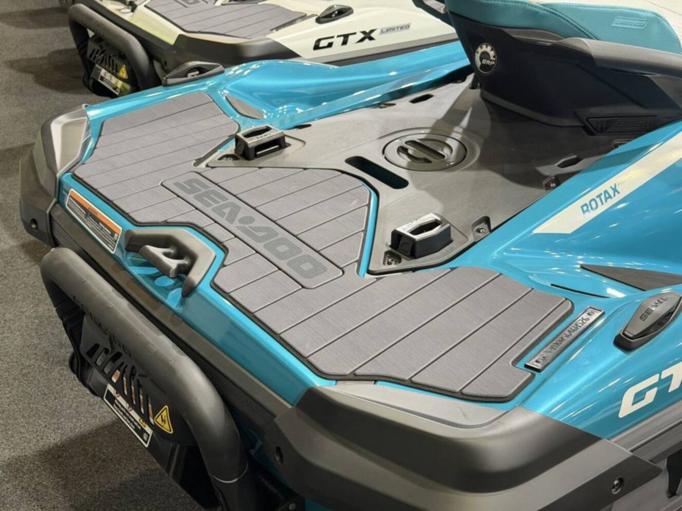 A photo of this 2026 Sea-Doo GTX Limited 325 Teal Metallic